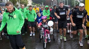 Bella Everlupi rides her Halberg Disability Sport Foundation funded trike at the start of the ANZA Challenge race with AUstralia and New Zealand teams.